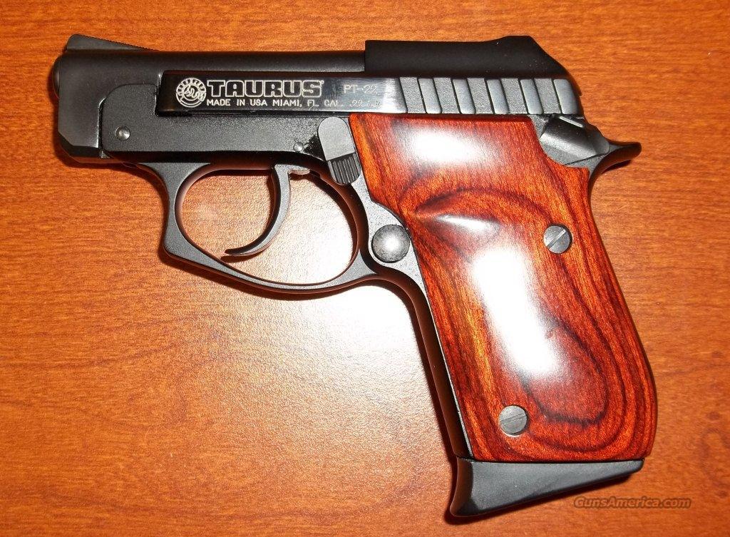 Taurus Pt Lr With Rosewood Gr For Sale At Gunsamerica