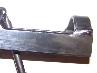 This slide has been repaired. Note weld mark. It is still running. 