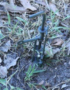 The tines on the bottom of the alarm are set perpendicular to the trigger, so even in soft soil they work great. 