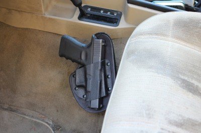 With a twist, the holster becomes more accessible to the passenger. 