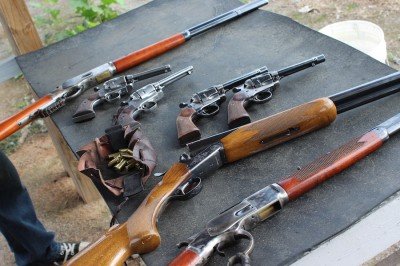 Some of the guns laid out at the practice session at Old Fort Gun Club in Fort Smith, Ar. 