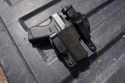 Holsters that incorporate an extra mag offer an easier way to maintain control of extra ammo.