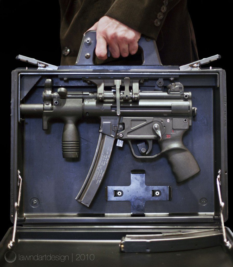 HK Briefcase with K gun installed note trigger on underside of briefcase handle. All rounds were kept in case upon firing. A Business card could be inserted on side of case to cover muzzle. The case itself is considered an AOW in the USA.