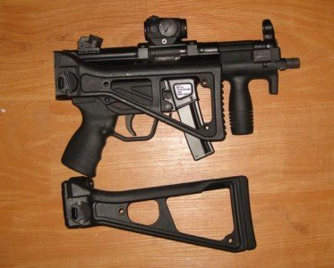 MP5K with side folder and fixed stock stocks are aftermarket. 