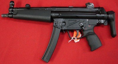 MP5 with collapsible stock this gun has a “clip on lower” as it is a converted HK 94. This is an SEF Lower. 