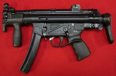 MP5k with collapsible stock this gun has a “clip on lower” as it is also a converted HK 94.