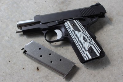 The short grip requires a short mag (but it will still hold 7 rounds.)