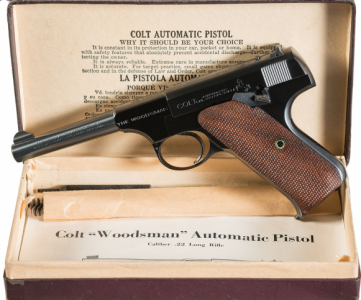 Colt Woodsman in original box.