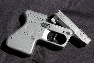 The pocket pistol has mass. 23 ounces, empty. 