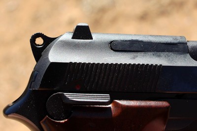 The rear sight is low-profile.