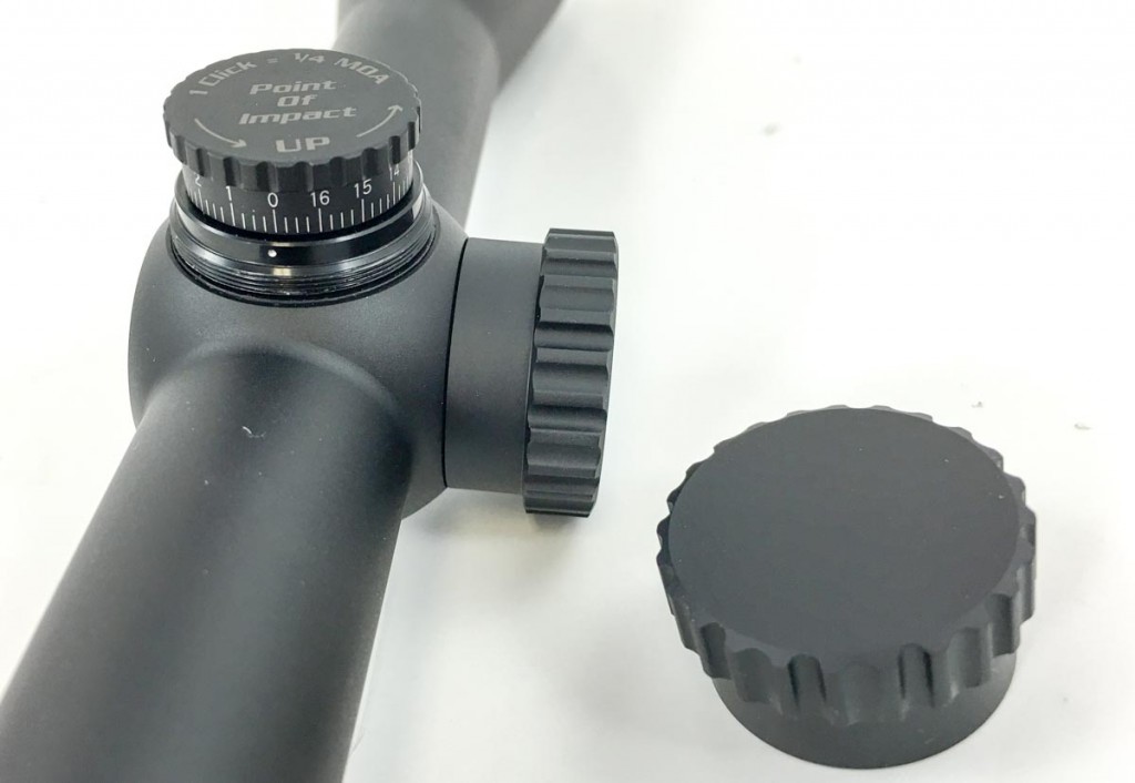 This Burris Fullfield II scope uses traditional covered turrets. However, when you remove the caps, they are hand adjustable. Some require a tool or screwdriver. 