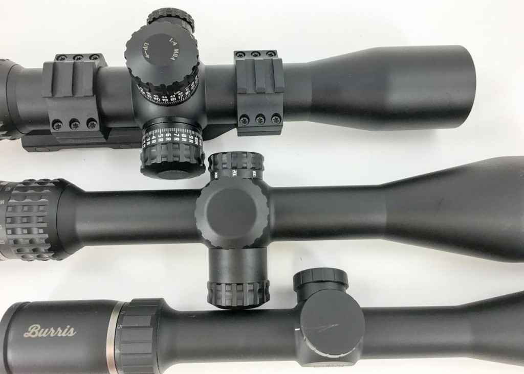Three different scope tube sizes, bottom to top: one-inch, 30mm, and 34mm.