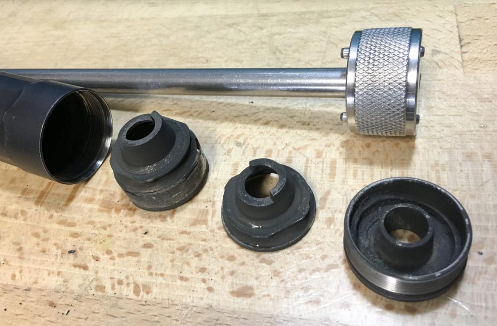 The included disassembly tool removes end and base caps and helps dislodge stuck baffles if necessary.