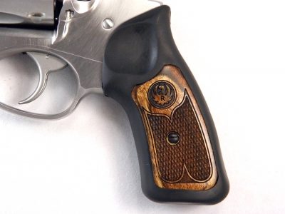 The Ruger SP101 comes with a set of comfortable synthetic grips with a an attractive wood insert with the Ruger logo.