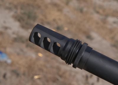 The threaded muzzle is topped off with a SilencerCo Harvester Big Bore .338 muzzle brake. 