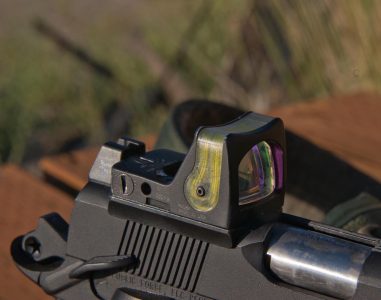 Republic Forge can cut the slide to accept optics such as this Trijicon RMR. Note the tall rear sight unit behind it. 