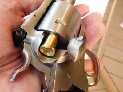 It’s a single-action revolver, so you load rounds one at a time through the side loading gate.