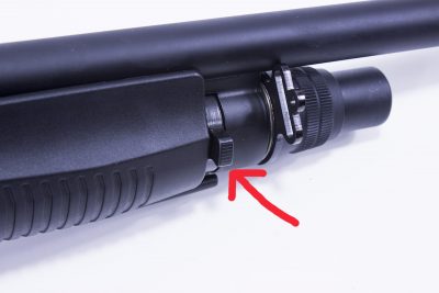 The switch for changing firing modes is a ring forward of the fore end that you rotated to change from pump to semi-auto.