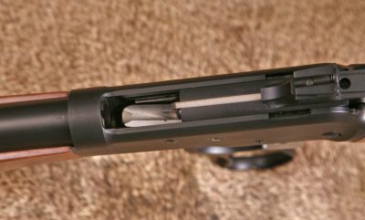 The open top receiver allows for ejected rounds or fired cases to come out the top of the Model 89. Note the visible shell lifter. 