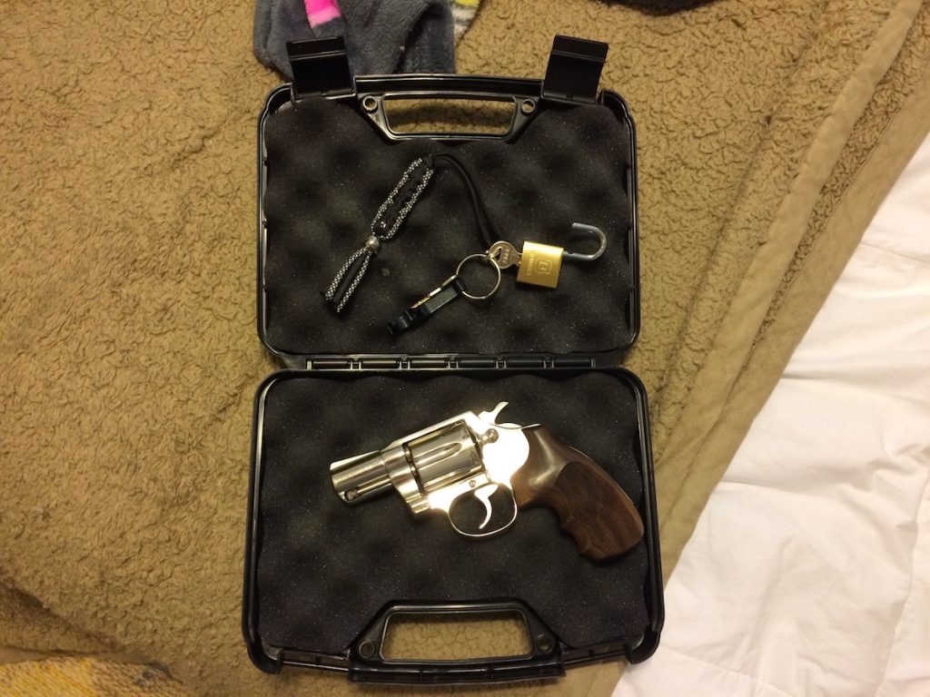 My revolver, along with the container, the lock and the key. 