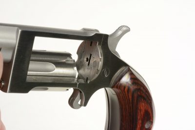 The cylinder of the Sidewinder swings out to the right side of the revolver's frame.