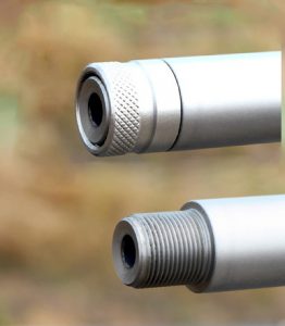 The muzzle is threaded to accept suppressors or muzzle brakes and comes with a thread protector cover.