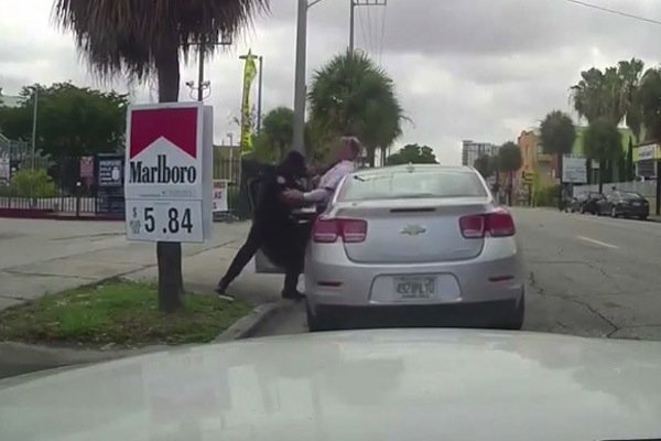 What caused these two Miami cops to throw down?