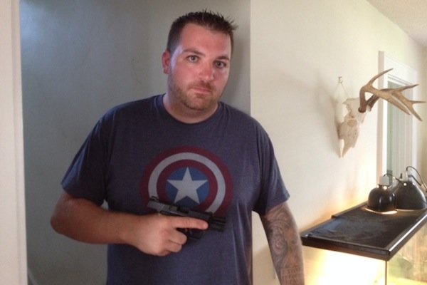 Navy Veteran draws gun, makes armed home-burglar cry