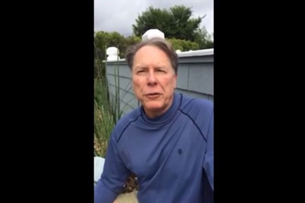 Wayne gets hair wet, accepts ice bucket challenge