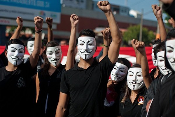 Hacker group Anonymous releases name of officer who shot Missouri Teen