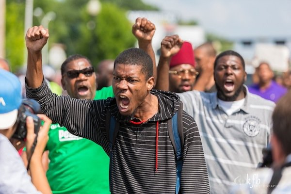 When is it a good idea to pull a gun on a crowd of protestors?