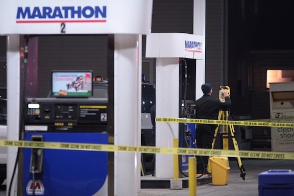 Gas station gunfight leaves two robbers dead, good guy wounded