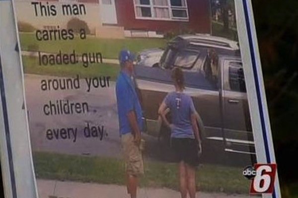 Woman posts sign of concealed carrier to warn neighborhood