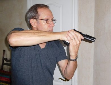 Bringing the muzzle down from the Extended position to what is referred to as the Combat High gives you a good room-clearing position. If possible retreat to a safe place, of course, and call law enforcement. But if you have loved ones you have to protect, this is a good position to use while moving through the house.