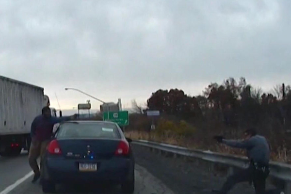 INSANE Dashcam Footage Shows Roadside Shootout between Police, Suspect