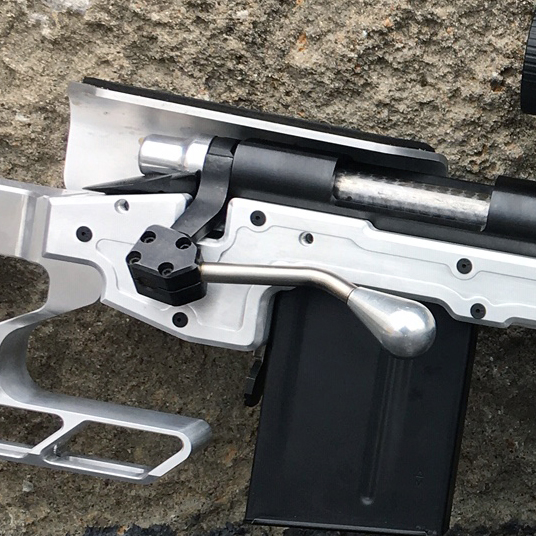 the bolt extension can be seen up close here. This add on that is included with the chassis brings the bolt handle further forward and closer to the shooter's reach.