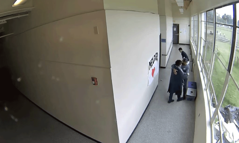Video Emerges of High School Football Coach Disarming, then Hugging Armed Student