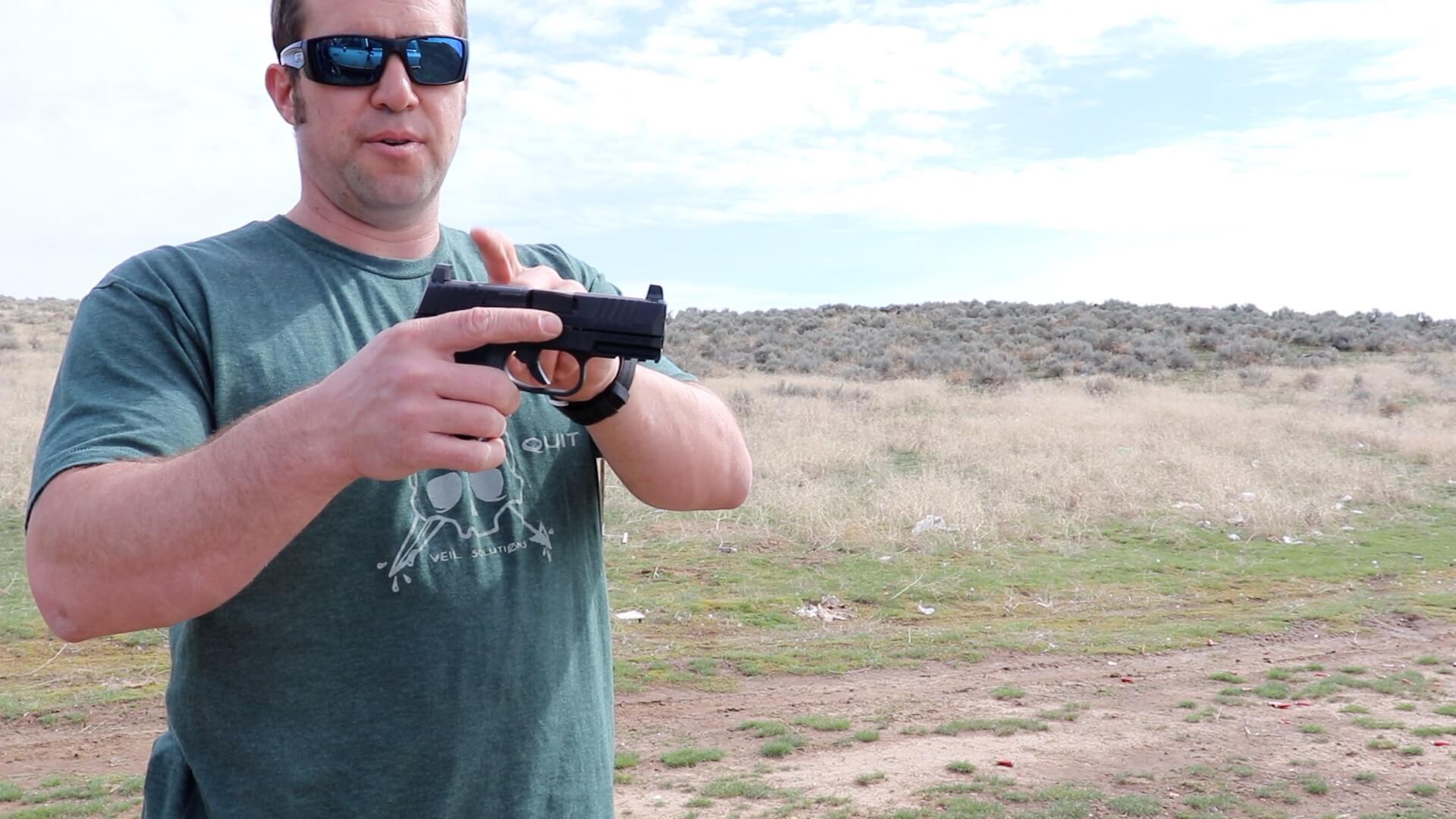 Author holding the FN 509 Compact MRD 9mm, best overall FN pistol