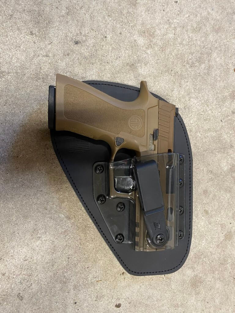 Clay Reviews Grey Man Tactical Molle Panel, Viridian Laser Handstop, & Ingenious N8 Holster