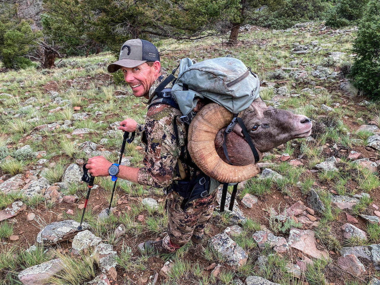 Hunter carrying the Stone Glacier Sky 5900 on the Xcurve frame in the mountains, best hunting backpack for mountain hunts