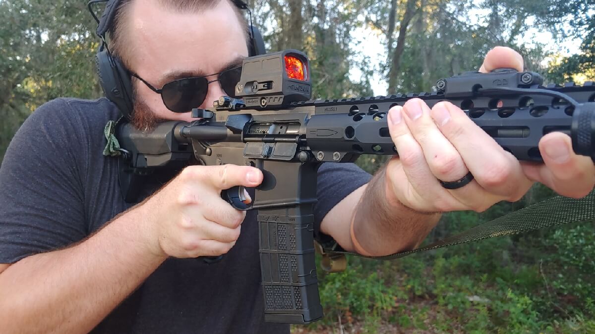 Holosun HS512C hooded red dot on an AR-15, best Holosun enclosed rifle dot 2026