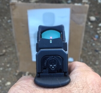 Learning to Shoot a Handgun with a Red Dot: Simple but not Easy