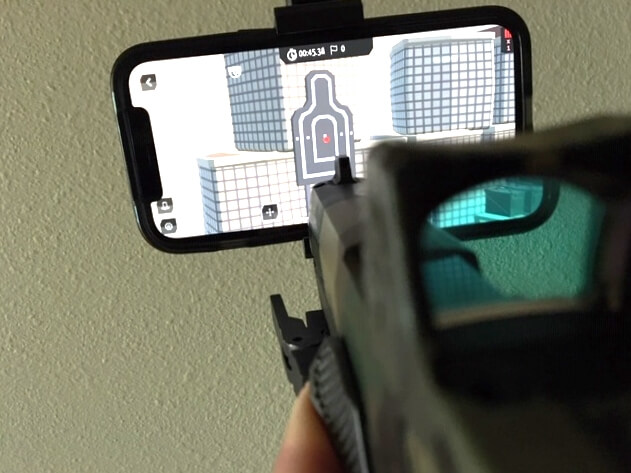 Learning to Shoot a Handgun with a Red Dot: Simple but not Easy