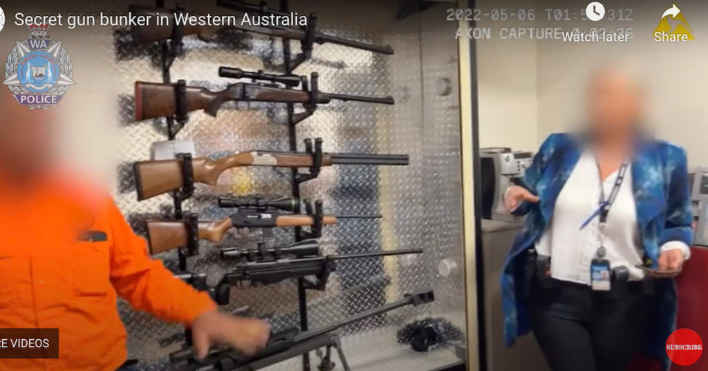 Two officials down in the underground bunker next to firearms.