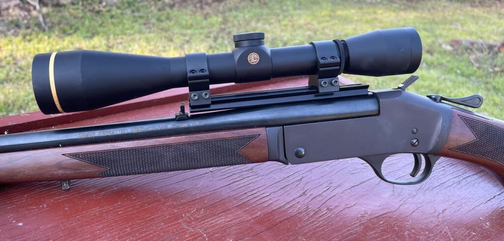 Henry Single Shot Rifle in .243 Winchester topped with a Leupold Scope.