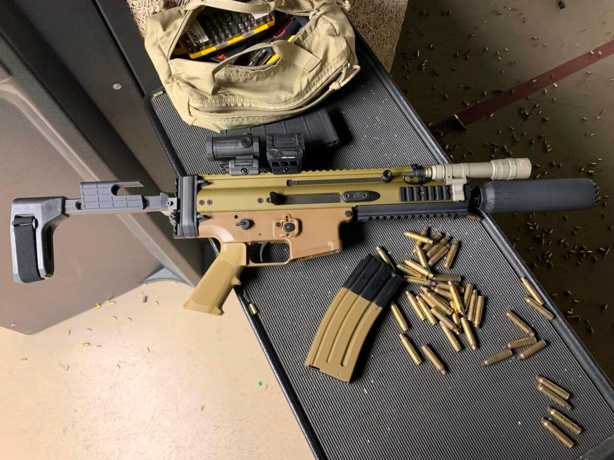 A suppressed Scar 15P at the gun range.