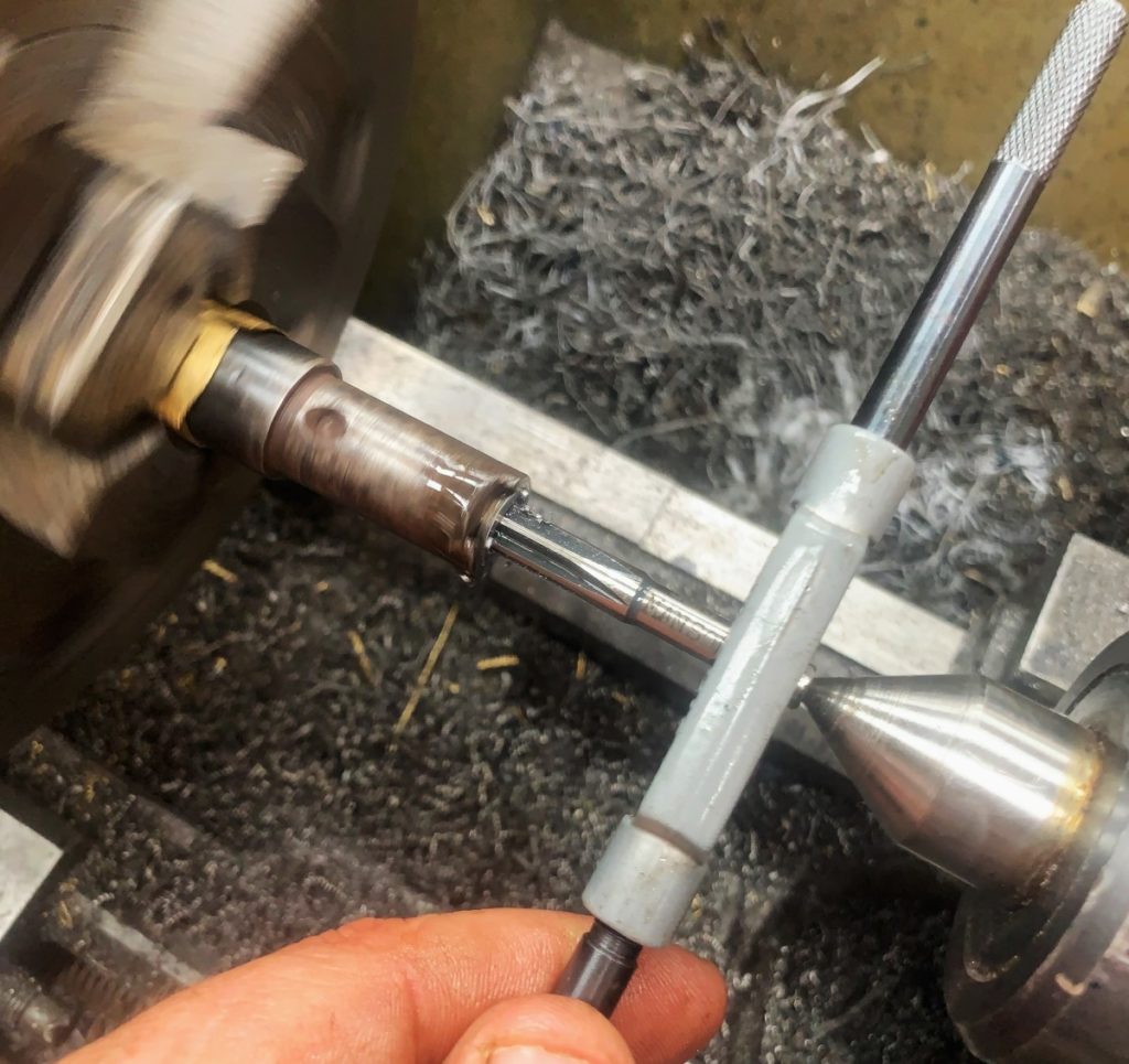 Using a chamber reamer to chamber the barrel in the lathe