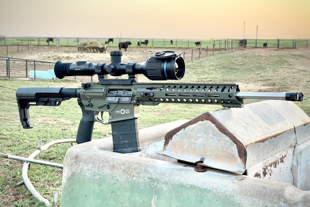 POF Rogue AR10 with Pulsar Thermion mounted on top overlooking some cattle out in the pasture