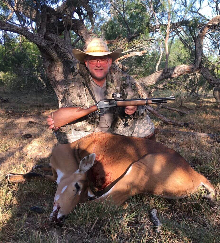 Hunter with Marlin 444 Trapper, downed nilgai deer