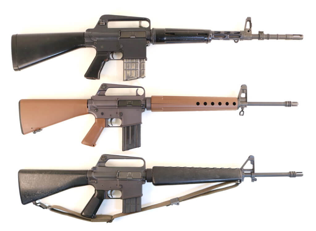 top to bottom, we have the Armalite AR10, the early AR15 as represented by the Brownells BRN Proto, and the Colt Model 602